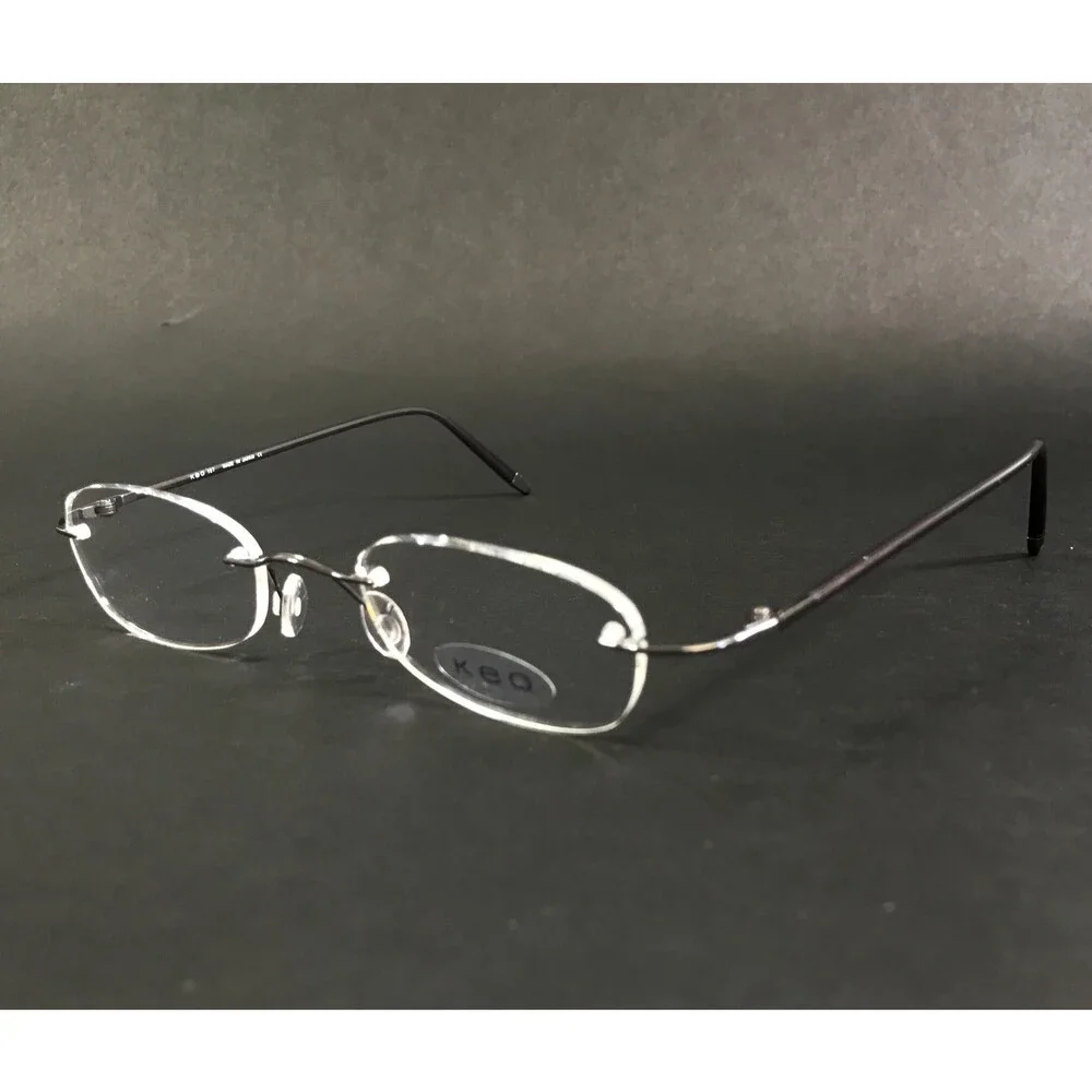 Keo Eyeglasses Frames 107 SGUN Satin Gunmetal Rimless Oval Titanium 47-20-140